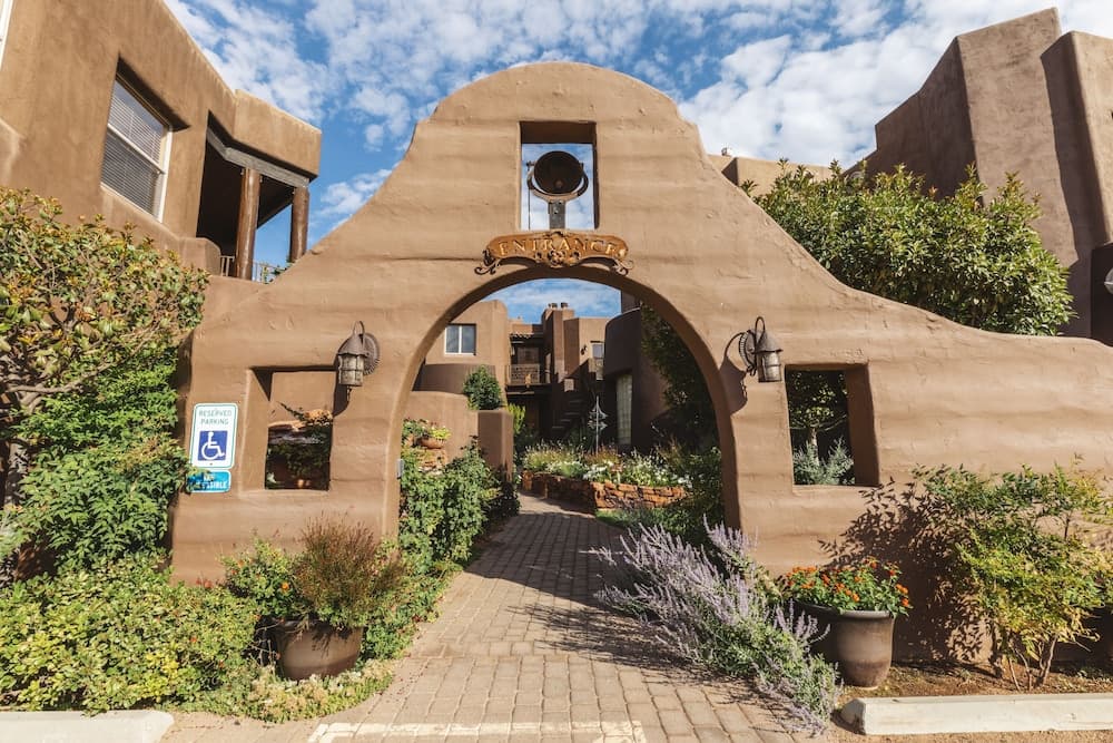 Adobe Grand Villas adobe-style boutique resort with red rock backdrop in Sedona, Arizona