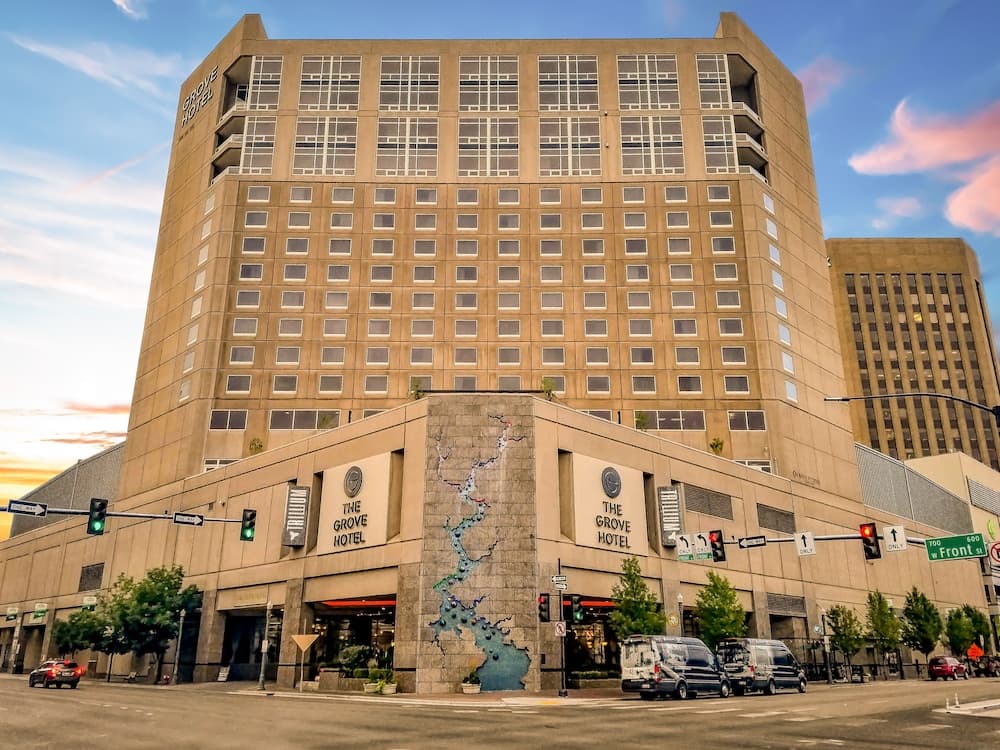 The Grove Hotel downtown Boise tower exterior with city skyline