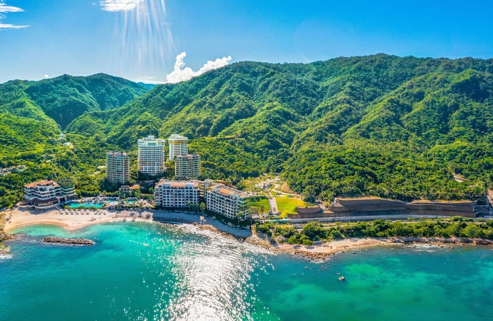Rooftop infinity pool at Hotel Mousai Puerto Vallarta with ocean views